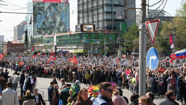 May 9, 2019. Novosibirsk, Russia. Victory Day. Procession "Immortal regiment". Many residents come with portraits of their relatives of veterans