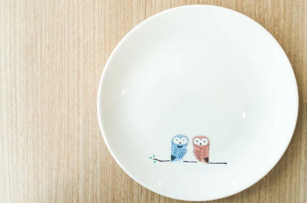 Couple owls on plate — Stock Photo, Image