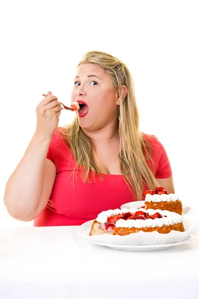 Overweight woman with cake — Stock Photo, Image