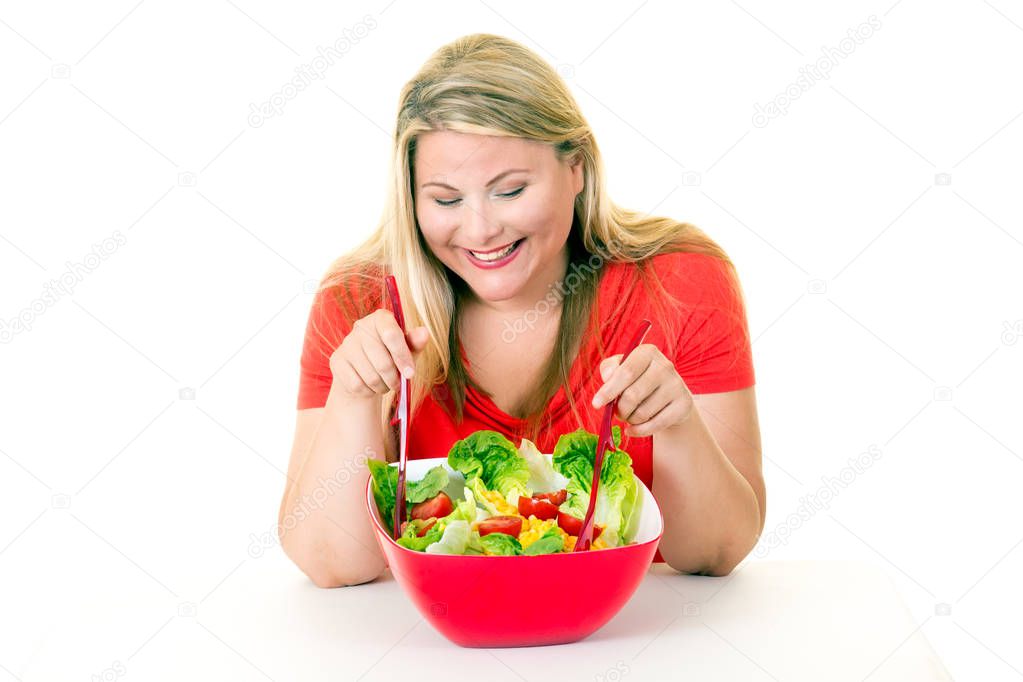 Happy dieting woman with salad