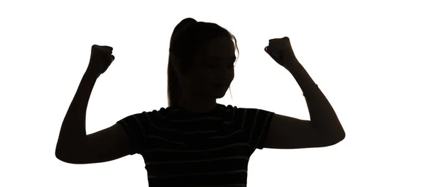 Silhouette Una Giovane Donna Sottile Mostra Muscoli Mani Bianche Sfondo — Foto Stock