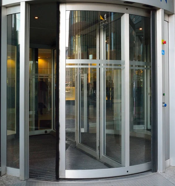 Revolving door to business world Royalty Free Stock Images