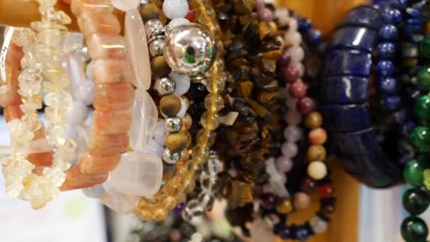 Beautiful semi-precious stone bracelets — Stock Video