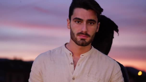 Attractive young man portrait at sunset — Stock Video