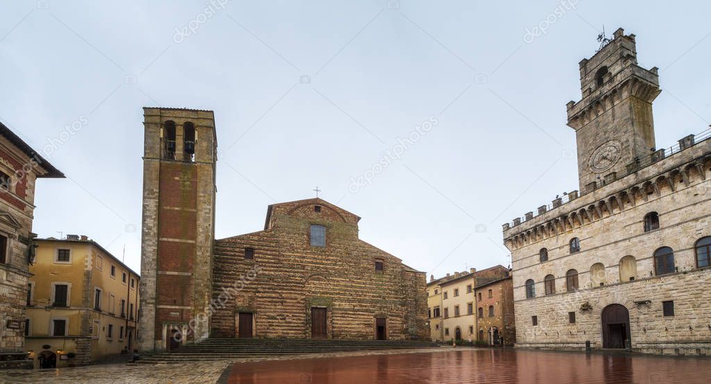 Rainy view of empty medieval Piazza Grande - main square in Montepulciano, Italy with Cathedral of Santa Maria Assunta and Palazzo Comunale (Town Hall).