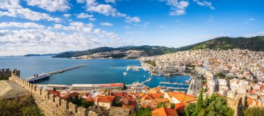 Aerial panoramic view with the city of Kavala in northern Greece with marina and seafront promenade  clipart