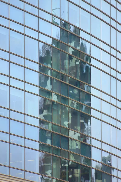 Conceptual view in the financial square of Milan: reflection of the vertical forest into Windows of Unicredit skycraper