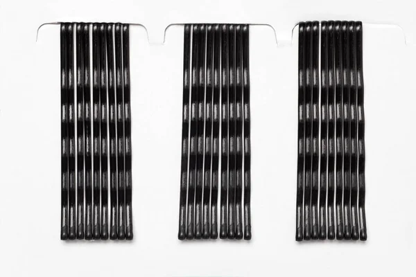 Black metal hair clips — Stock Photo, Image