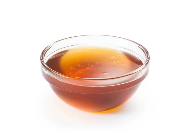 Miel fresca en un tazón de vidrio — Foto de Stock