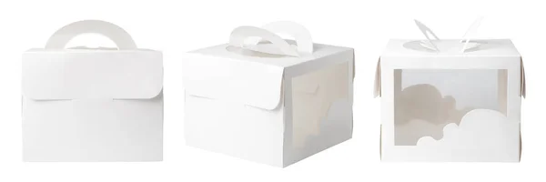 ケーキ用ハンドルモックアップ付きの空のギフト包装箱 白地に隔離された ロイヤリティフリーのストック画像