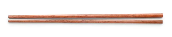 用白色背景隔离的木制筷子 顶部视图 — 图库照片