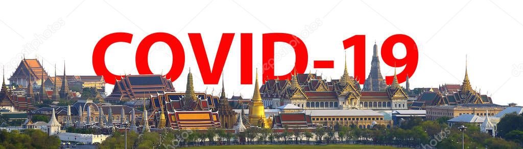 COVID-19 coronavirus outbreak text on Wat pra kaew, Grand palace Temple of the Emerald Buddha travel destination in Bangkok, Thailand.  Isolated white with clipping path concept 