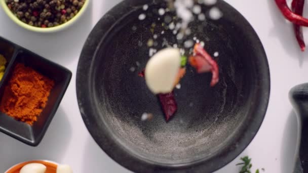 Top View Herbs Dried Peppers Seasonings Garlics Being Poured Wooden — Stock Video