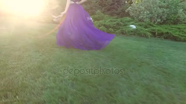 Girl and dog runing in summer evening. — Stock Video