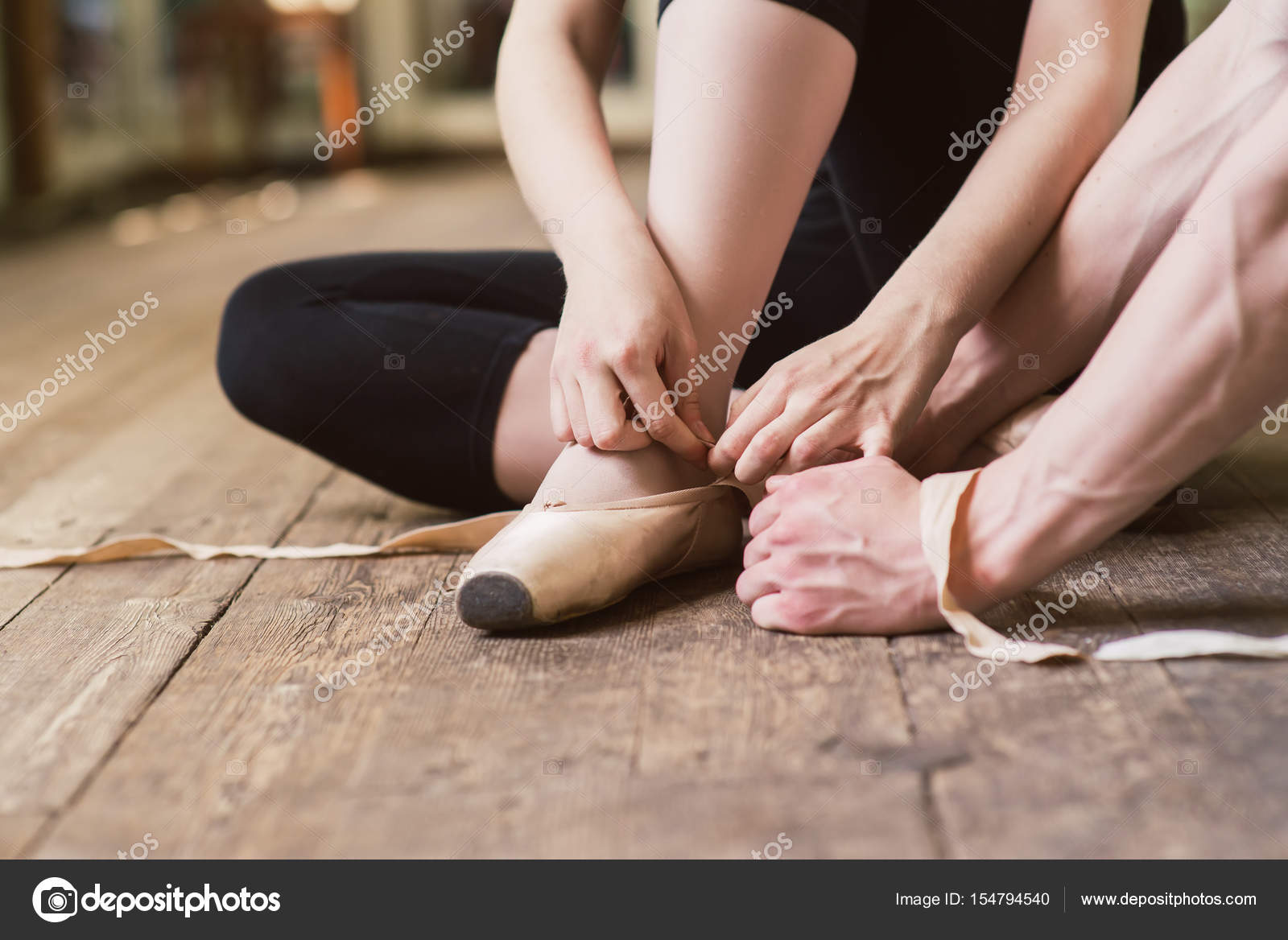 ballerina putting on shoes