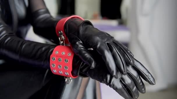 Hands Black Leather Gloves Red Cuffs Unfocused Close Female Hands — Stock Video