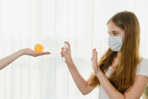Young Female Wearing Medical Mask Use Spray Antiseptic Pet Yellow — Stock Photo, Image