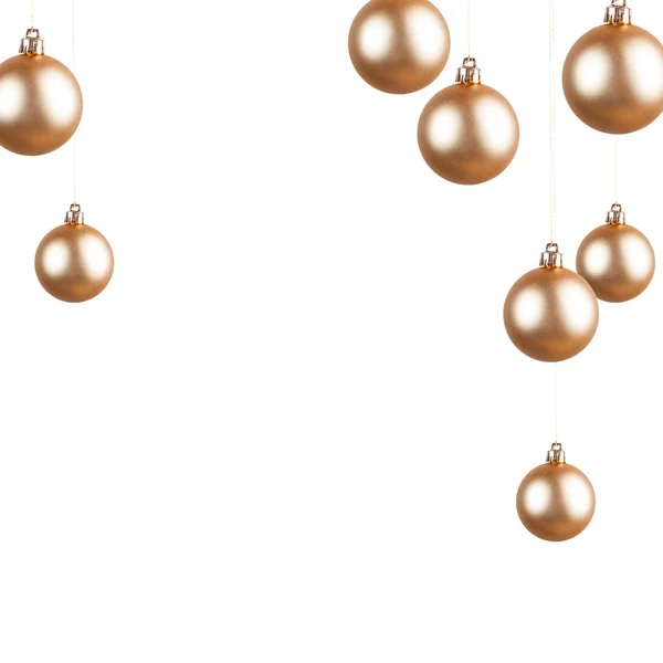 Golden Christmas ornaments on a Christmas background — Stock Photo, Image