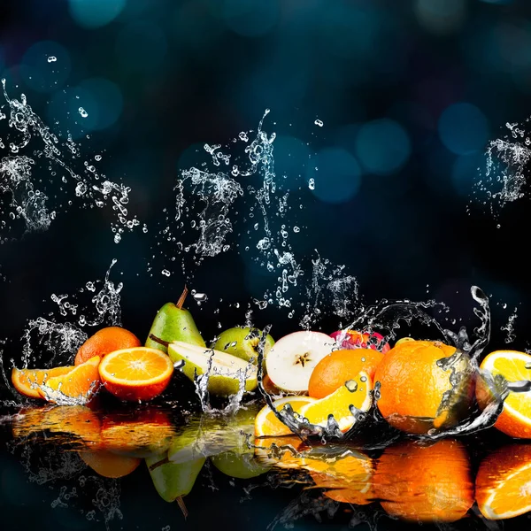 Orange fruits and Splashing water