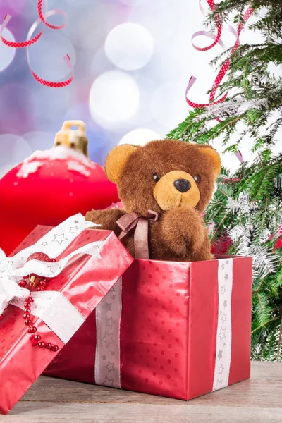 Presente de Natal no fundo de Natal — Fotografia de Stock