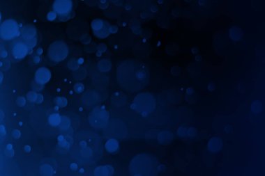 Siyah arkaplanda Noel mavisi bokeh, soyut.