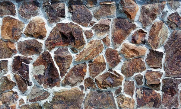 Fondo de piedra decorativa de color en la fachada —  Fotos de Stock