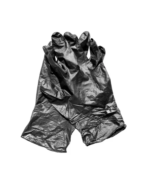 Paar rubberen beschermende zwarte handschoenen op een andere geïsoleerde witte achtergrond. Nieuwe wegwerphandschoenen van rubber — Stockfoto
