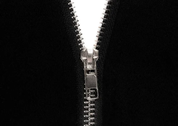 Öppen dragkedja eller kläd lås på svart tyg — Stockfoto