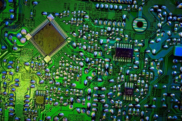Close up background of a green electronic circuit board — Stock Photo, Image
