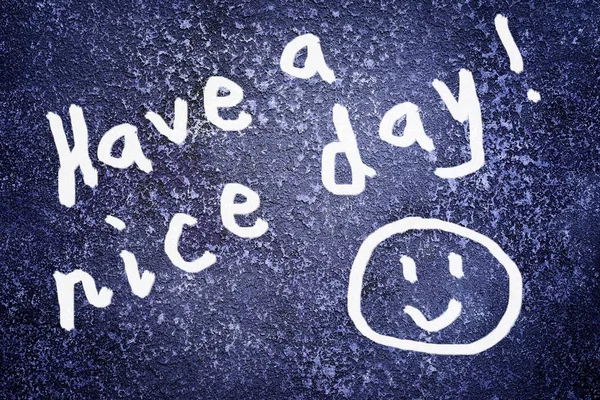 Inscription have a nice day and smile icon on the abstract grunge dark navy background — Stock Photo, Image