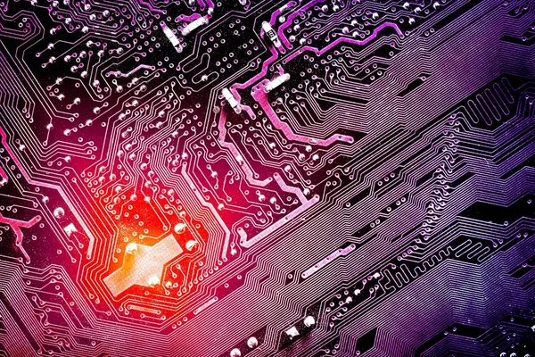 Close up van een afgedrukte computer circuit bord. Getinte in felle kleuren met lichte vlekken — Stockfoto