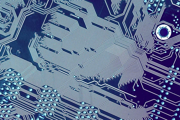 computer motherboard, white silhouettes on a blue background. top view diagonal composition.