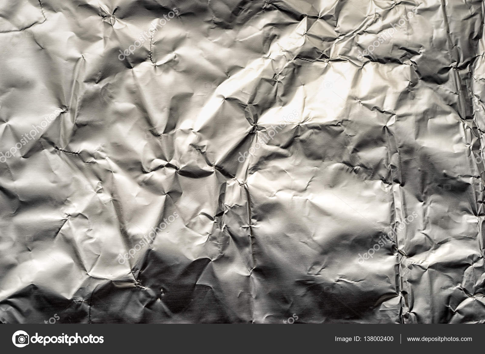 Crushed tin foil as an abstract textured background — Stock Photo © Elf+11 138002400
