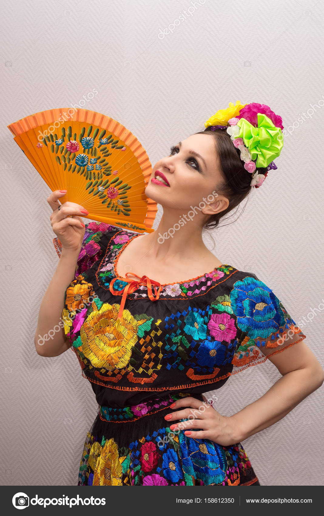 https://st3.depositphotos.com/2543399/15861/i/1600/depositphotos_158612350-stock-photo-beautiful-smiling-mexican-woman-in.jpg