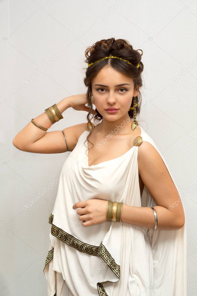 beautiful greek young woman in white ancient tunic