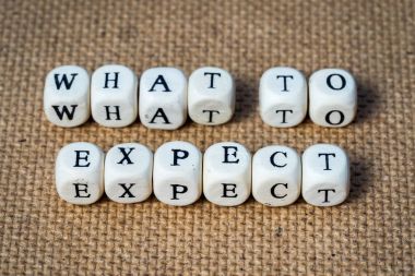 Ne oyuncak küpleri harflerle yapılan kelime beklemek