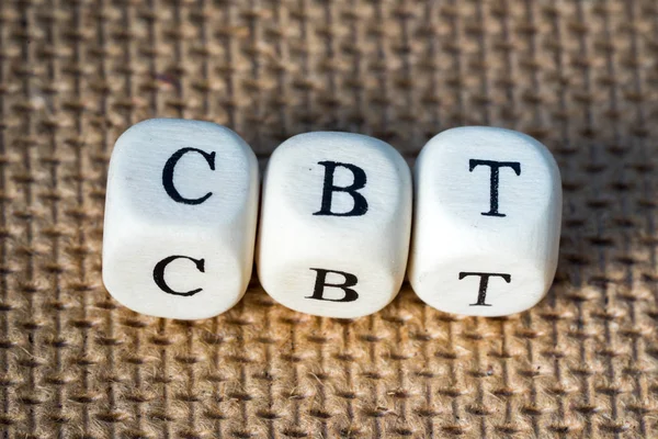 Cbt-Wort aus Spielzeugwürfeln mit Buchstaben — Stockfoto