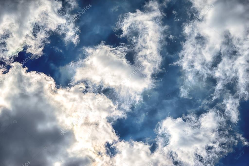 Blue sky with white clouds closeup