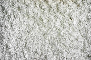 Beyaz çimento duvardaki dışbükey desen dokulu bir arka plan olarak