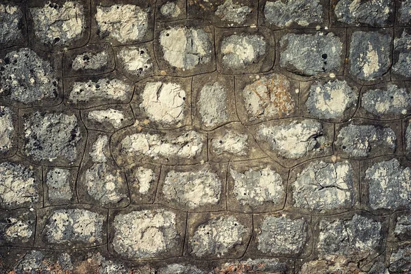 Gris se desvaneció antigua muralla de piedra medieval —  Fotos de Stock