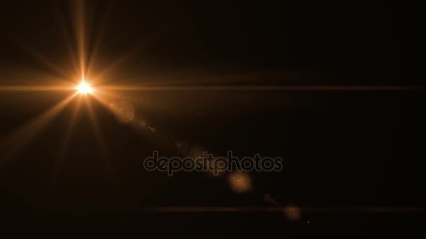 Animation of abstract sun burst with digital lens flare light movement over black background — Stock Video