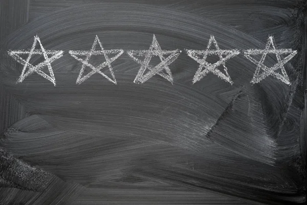 Five stars rating on chalkboard — Stock Photo, Image