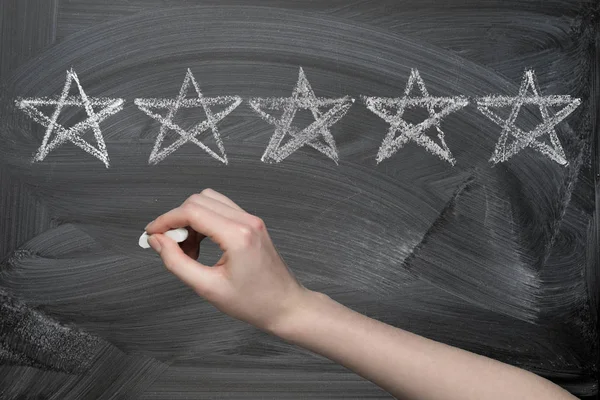 Hand drawing five stars rating on chalkboard — Stock Photo, Image