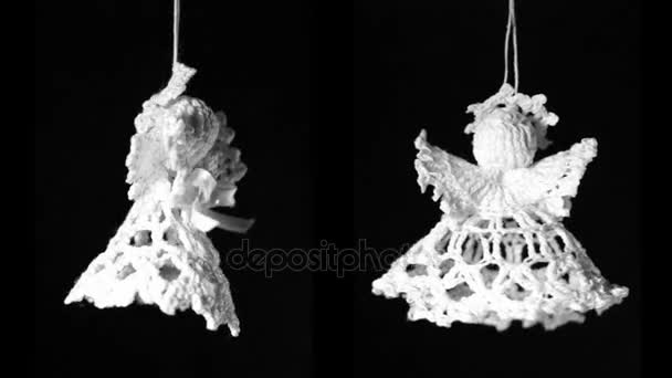 Two White Crochet Angels Hang Thread Black Background — Stock Video