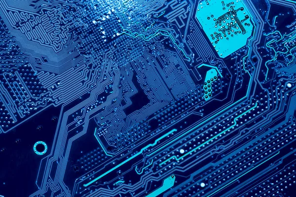 blue circuit board background of computer motherboard