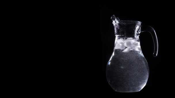 Clean Water Concept Water Ice Rotate Transparent Jug Isolated Black — Stock Video