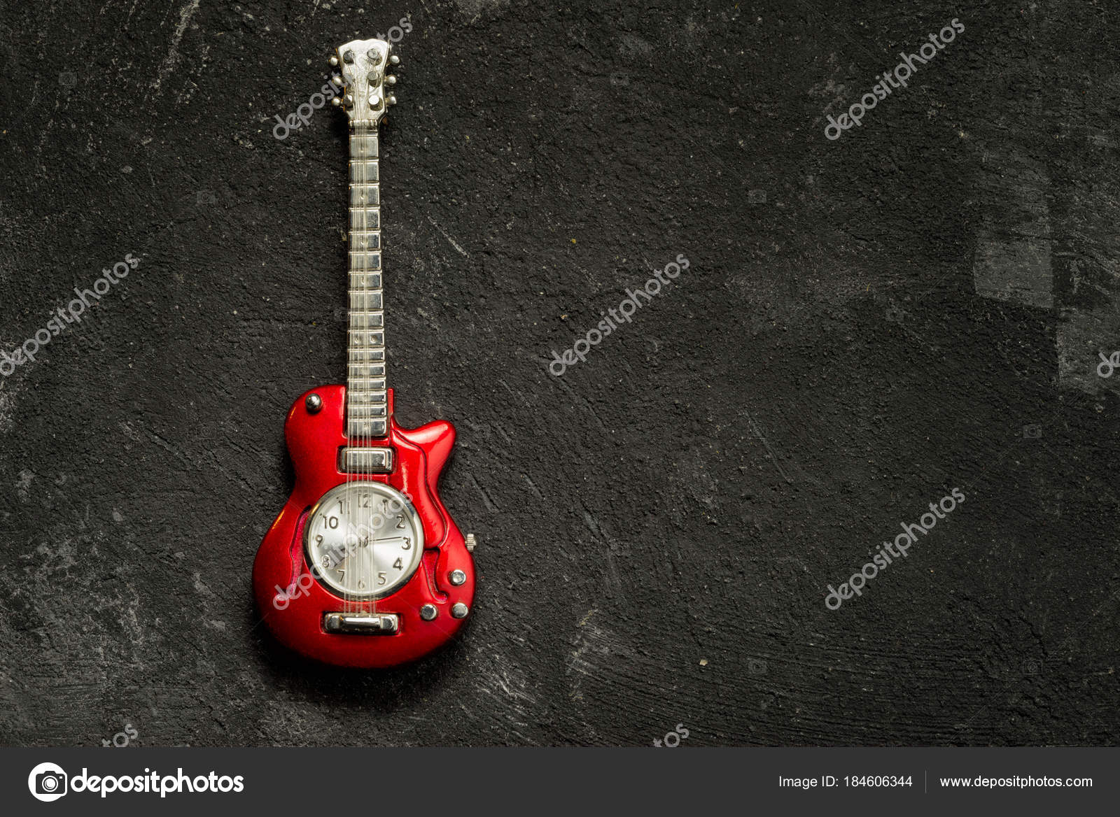 red toy guitar