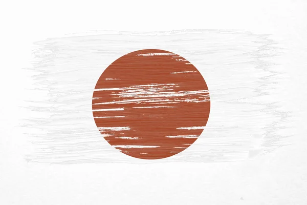 艺术刷水彩画日本国旗吹在风中隔绝在白色背景上 — 图库照片