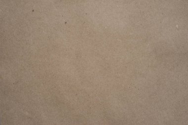 Kraft kağıt dokusu en küçük ayrıntısına kadar. Geri dönüştürülmüş sade çevre dostu araç lojistik iş sunumları için elyapımı gri doğal malzeme.