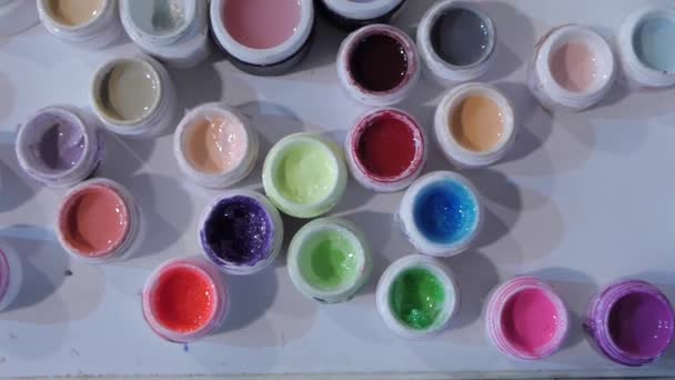 Coloured nail polish. Many colored test samples. — Stock Video